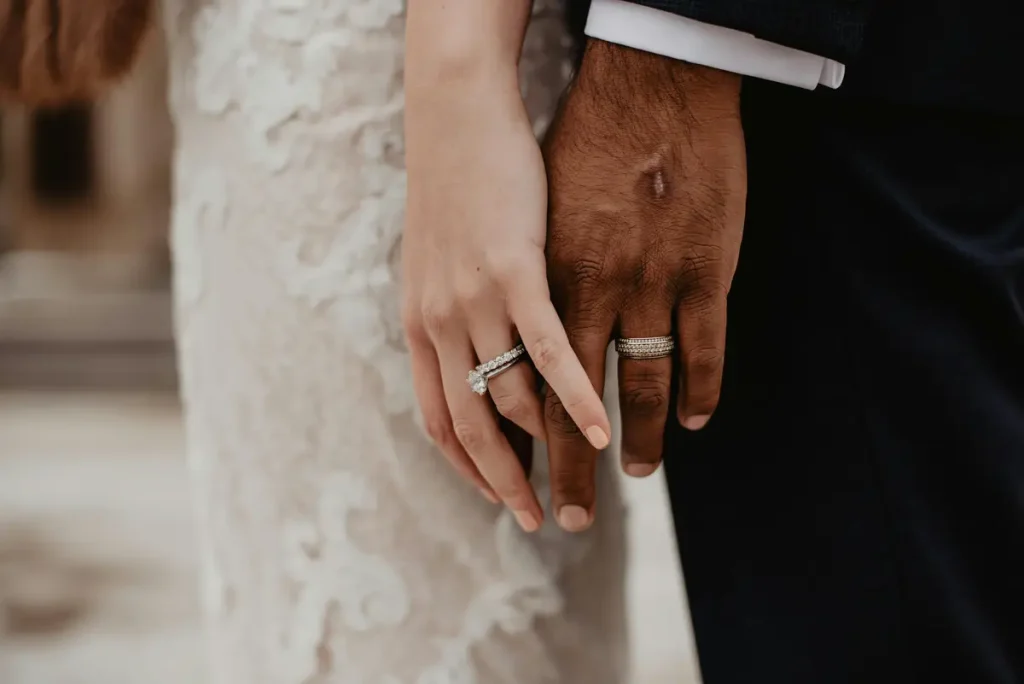 man holding woman's hand